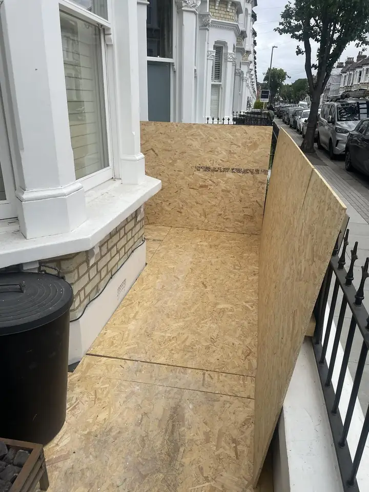 After: Front garden full of renovation waste. Cleared.